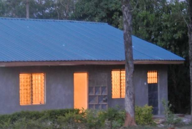 The Martens Africa community library building at dusk